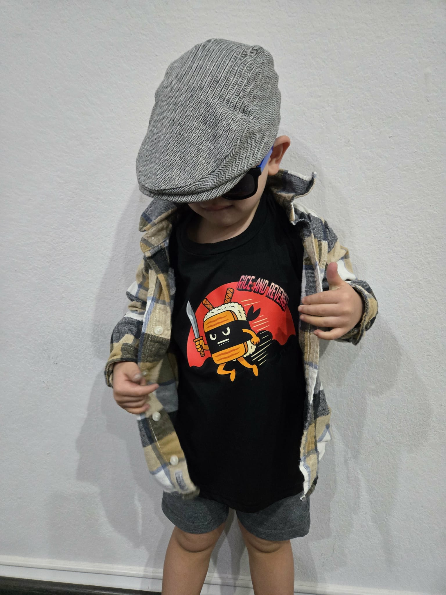 Toddler wearing black Rice and Revenge graphic tee with plaid jacket - Filipino Streetwear kids by Spam Loves Rice